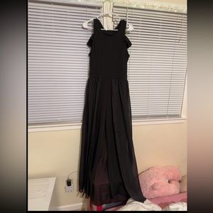 Black jumpsuit with chiffon draping
